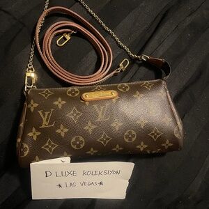 Authentic LV Eva clutch with sling